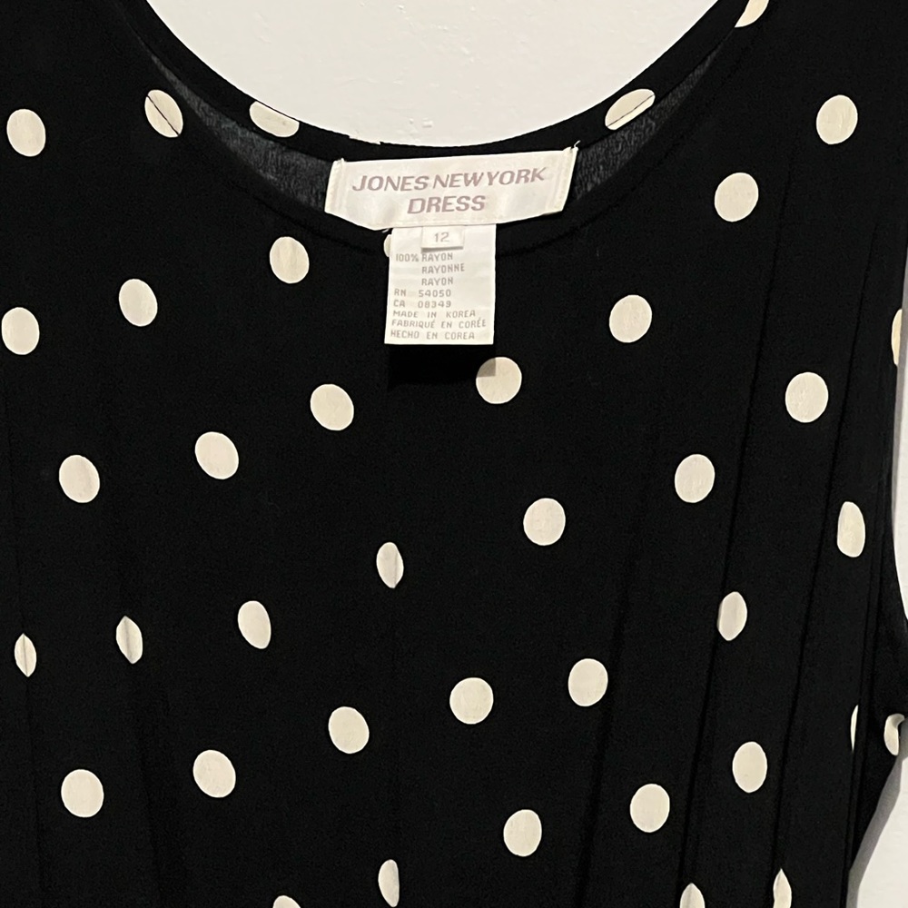 Used but new long navy blue with dots size 12